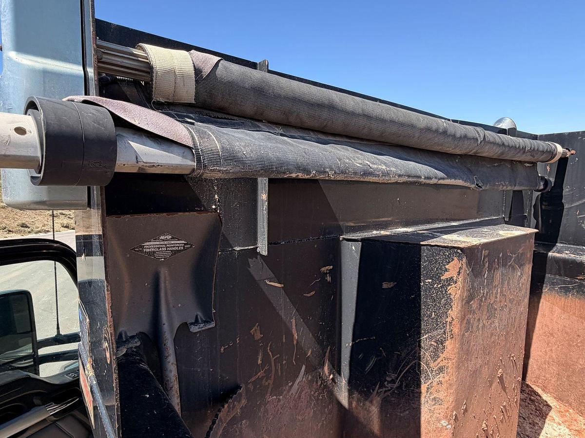 Used 2023 Kenworth T880 tri-axle dump truck, 123,870 miles