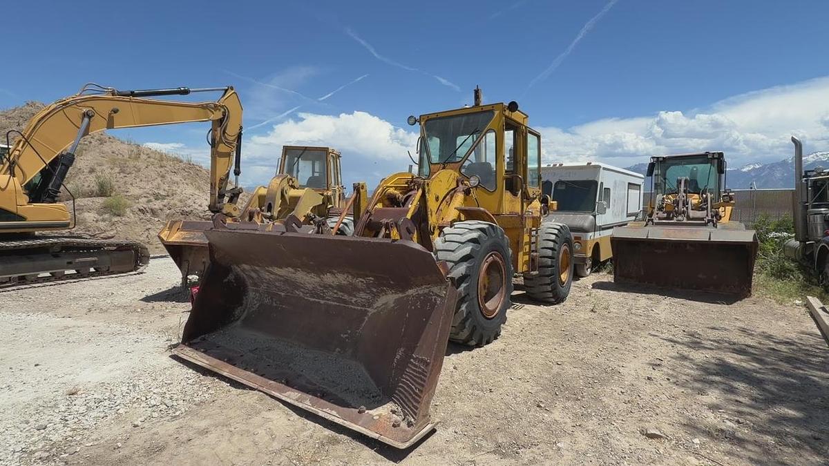 Used Cat 950 Loader with side dump trench bucket