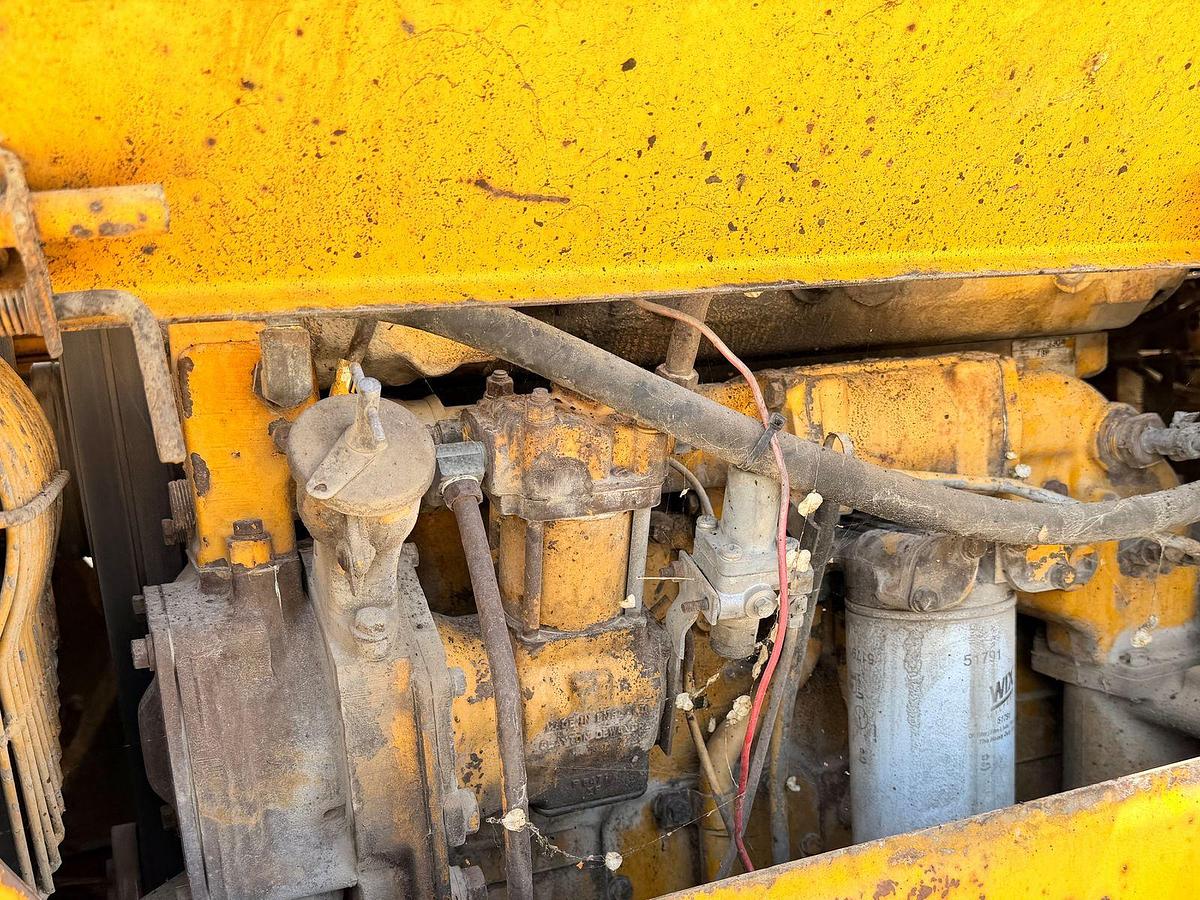 Used Cat 950 Loader with side dump trench bucket