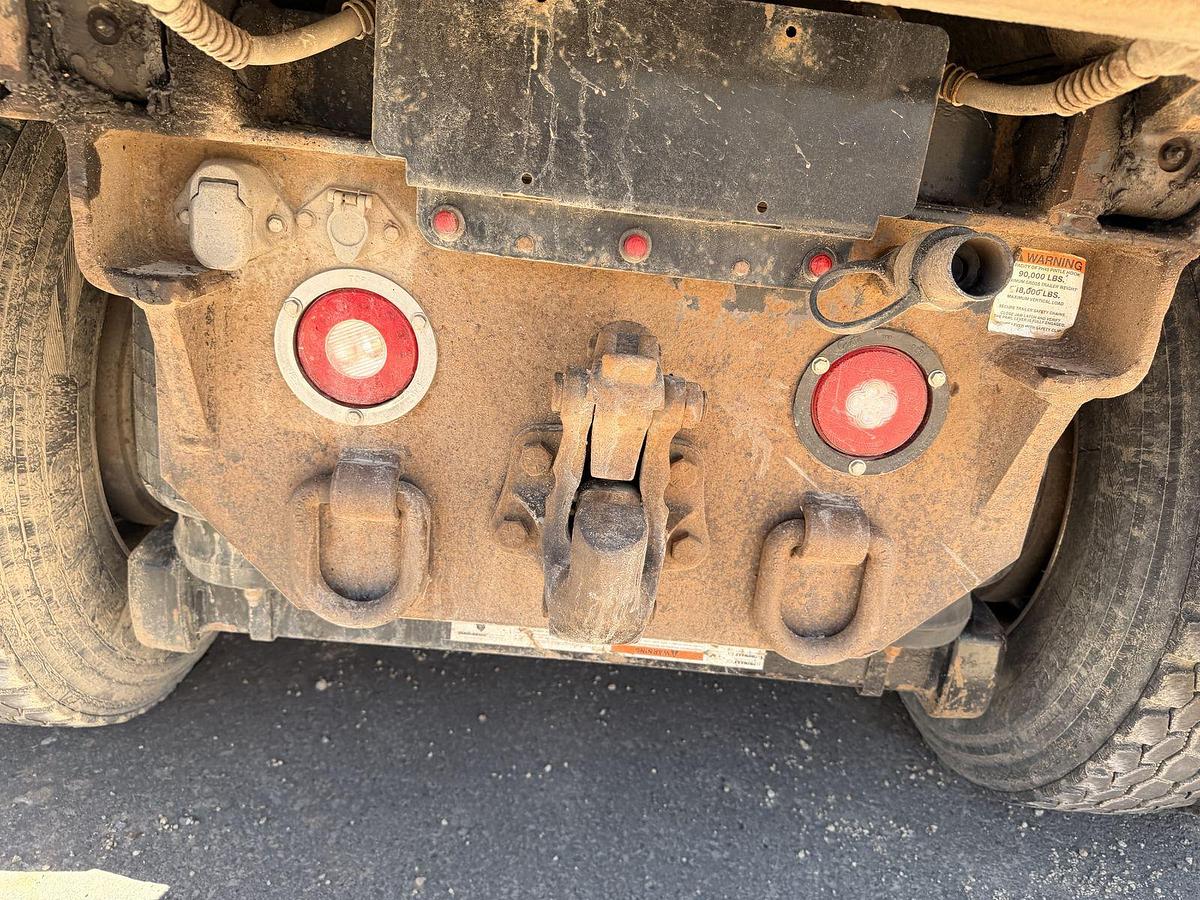 Used 2023 Kenworth T880 tri-axle dump truck, 123,870 miles