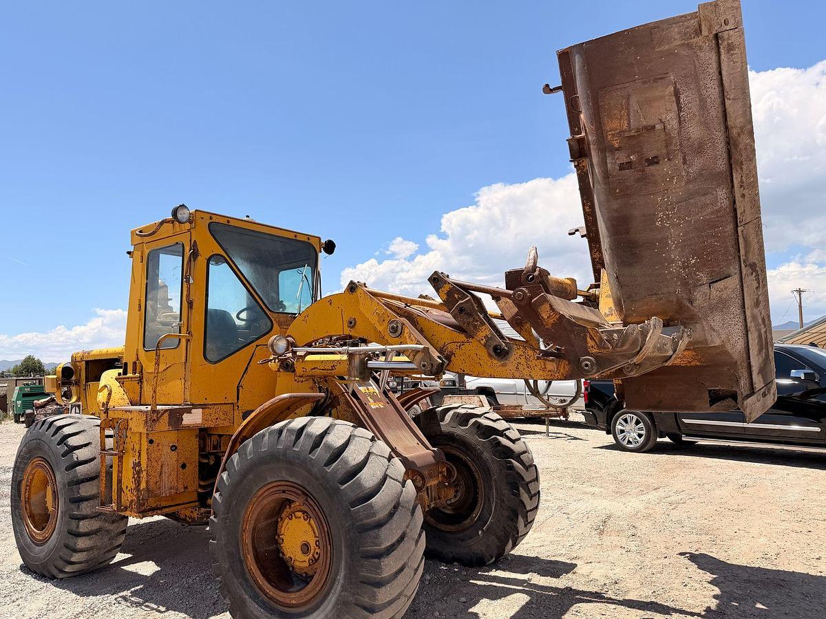 Used Cat 950 Loader with side dump trench bucket