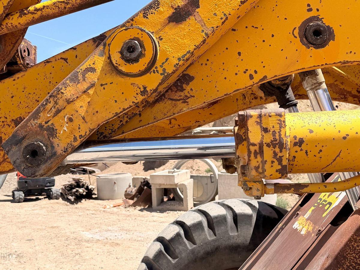 Used Cat 950 Loader with side dump trench bucket