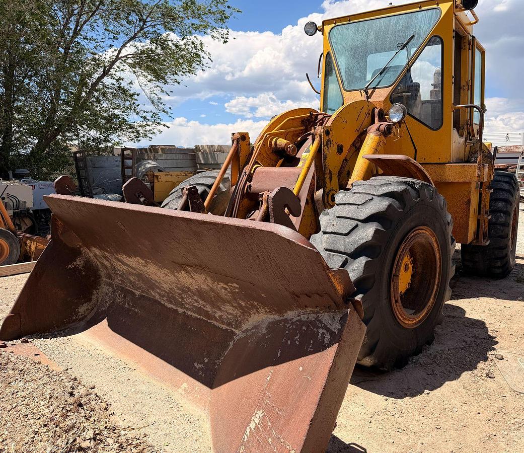Used Cat 950 Loader with side dump trench bucket