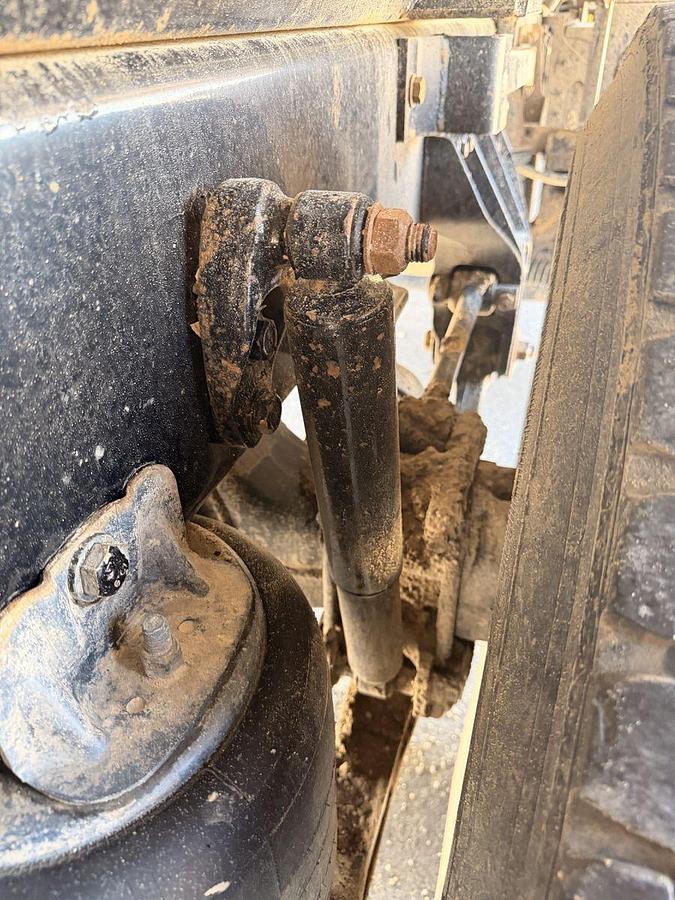 Used 2023 Kenworth T880 tri-axle dump truck, 123,870 miles