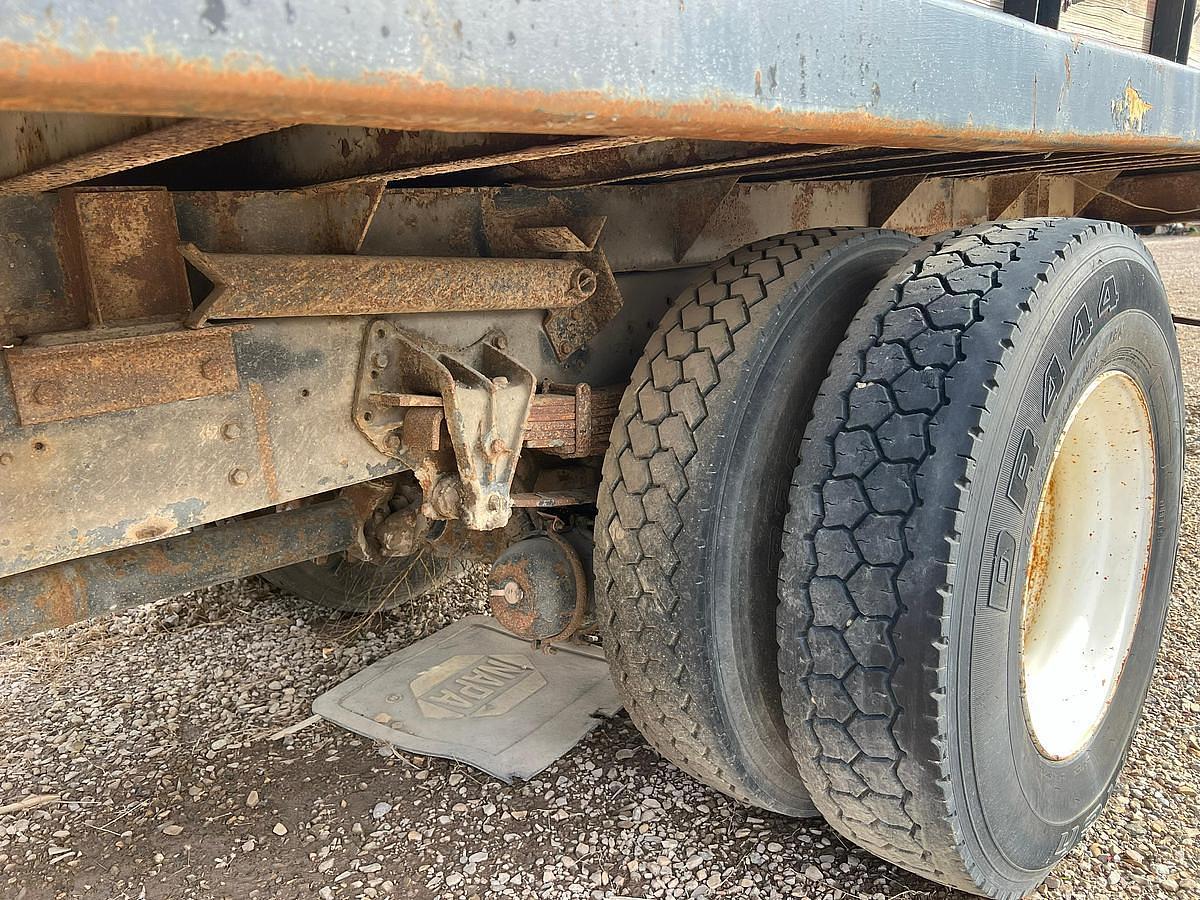 Used 1990 International 8300 Eagle Flatbed Dump Truck, Stake Body. flatbed