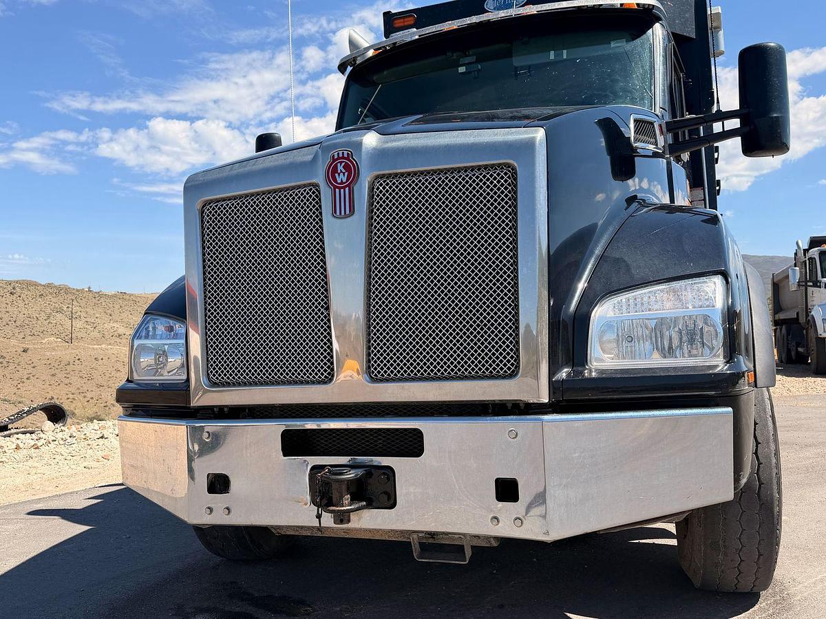 Used 2023 Kenworth T880 tri-axle dump truck, 123,870 miles