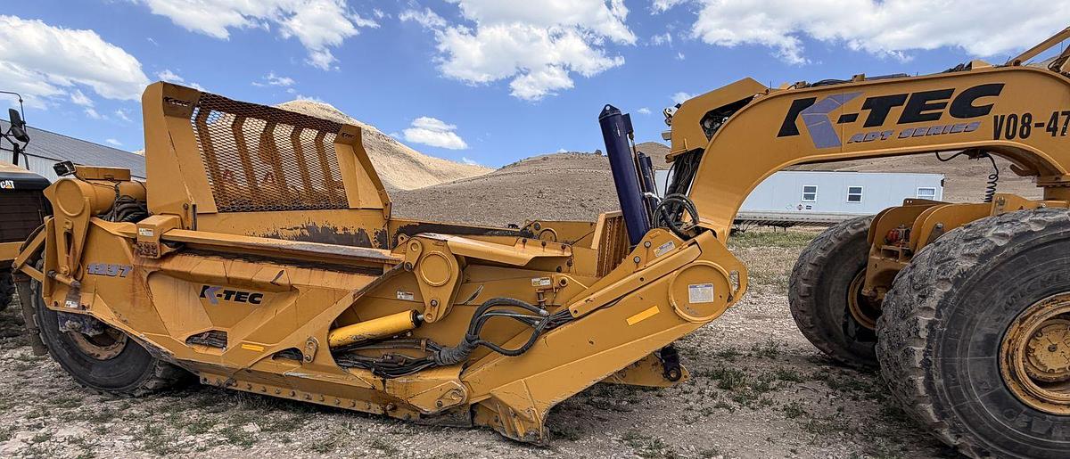 Used Caterpillar 740B, articulated dump truck with KTec Scraper