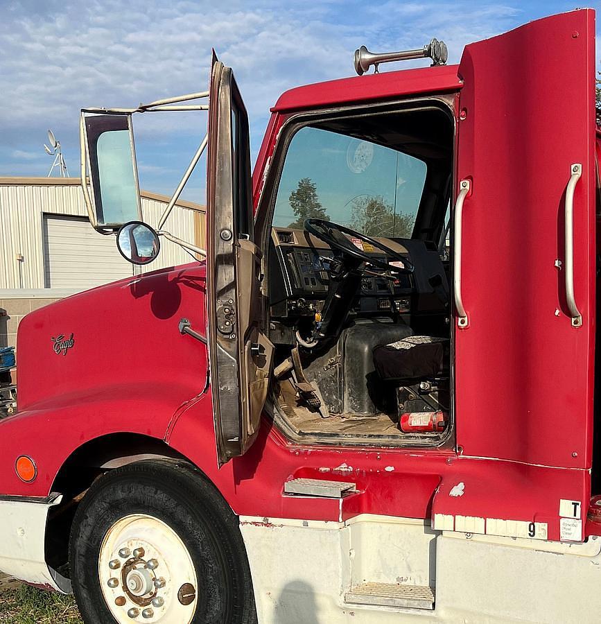 Used 1990 International 8300 Eagle Flatbed Dump Truck, Stake Body. flatbed