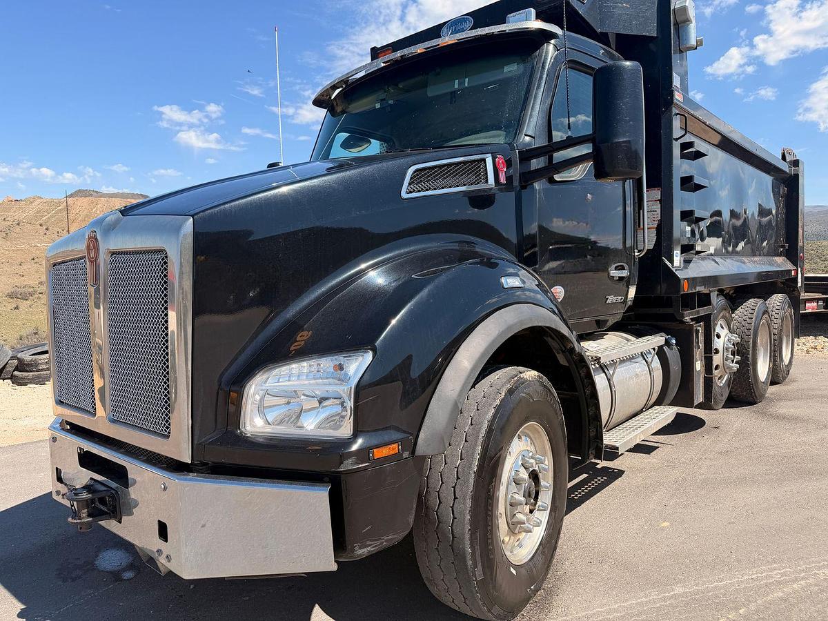 Used 2023 Kenworth T880 tri-axle dump truck, 123,870 miles