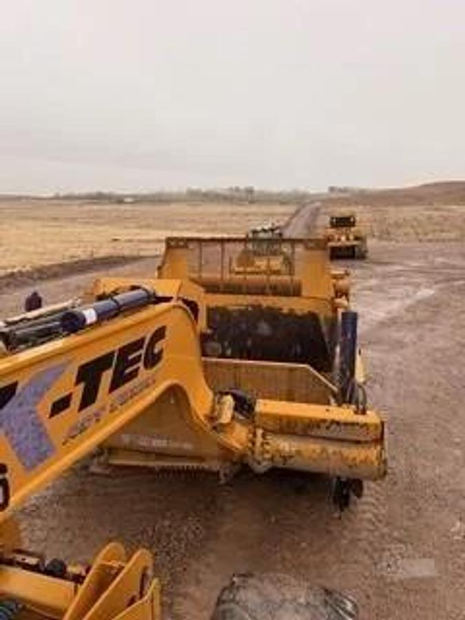 Used Caterpillar 740B, articulated dump truck with KTec Scraper