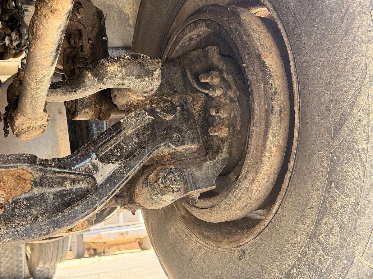 Used 2023 Kenworth T880 tri-axle dump truck, 123,870 miles