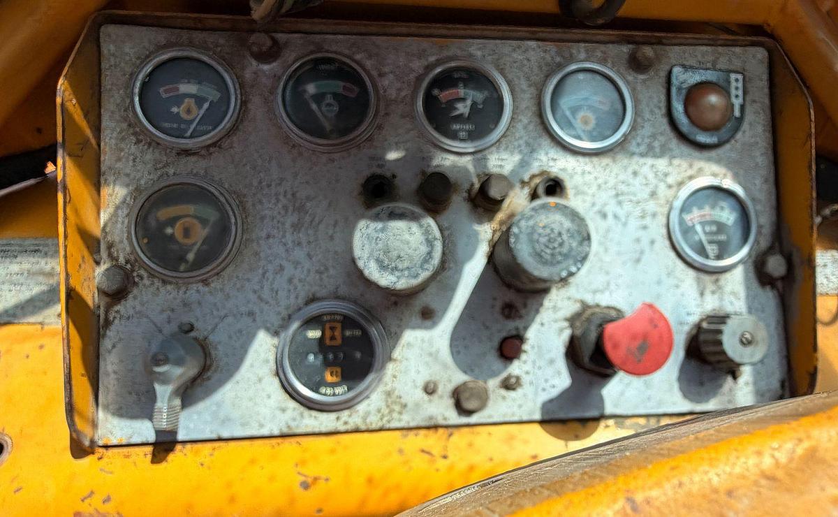 Used Cat 950 Loader with side dump trench bucket
