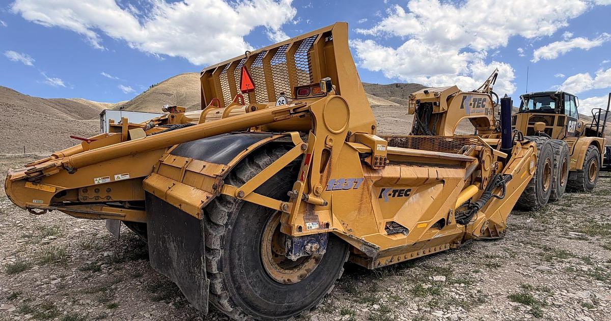 Used Caterpillar 740B, articulated dump truck with KTec Scraper