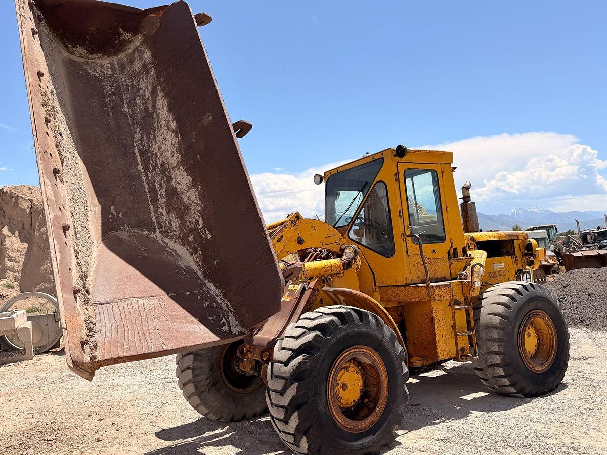 Used Cat 950 Loader with side dump trench bucket
