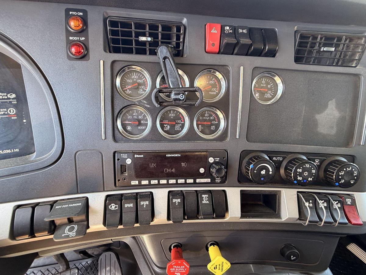Used 2023 Kenworth T880 tri-axle dump truck, 123,870 miles