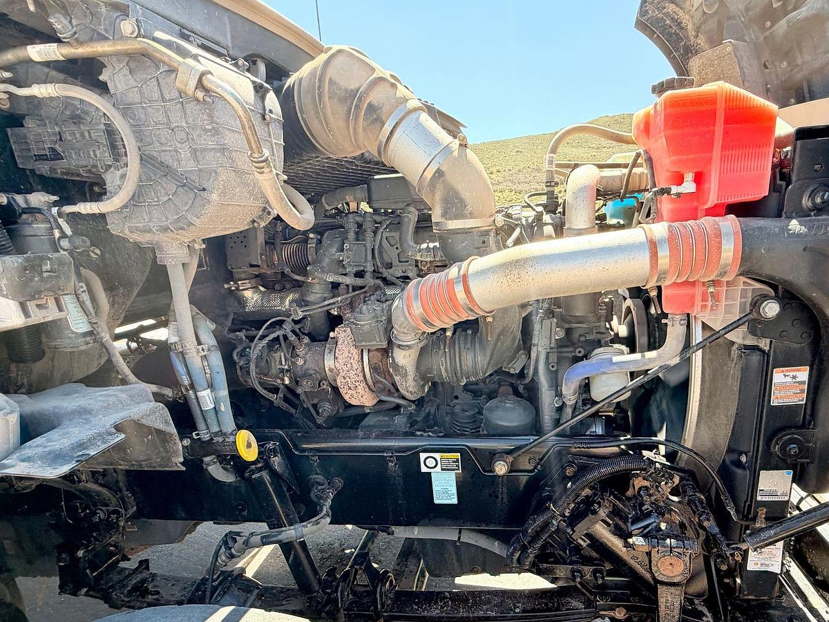 Used 2023 Kenworth T880 tri-axle dump truck, 123,870 miles