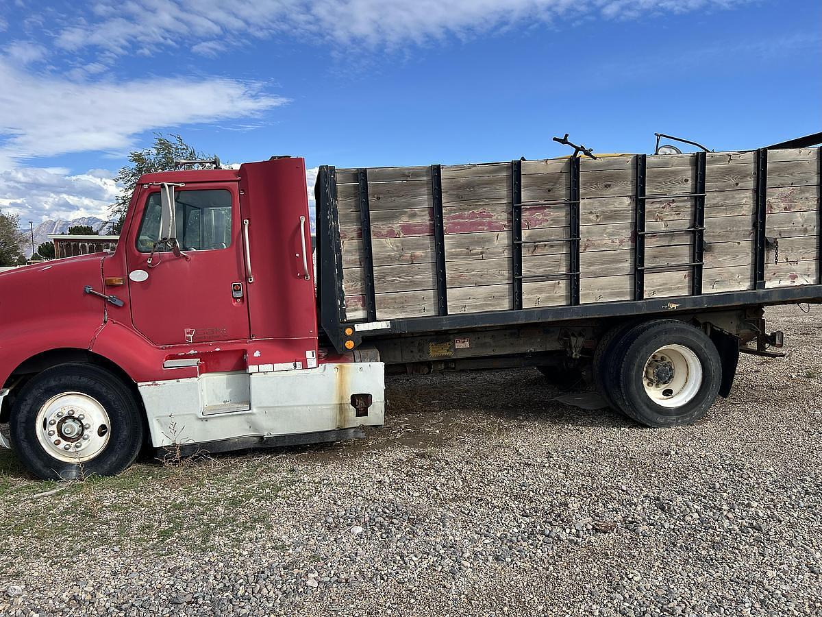 Used 1990 International 8300 Eagle Flatbed Dump Truck, Stake Body. flatbed