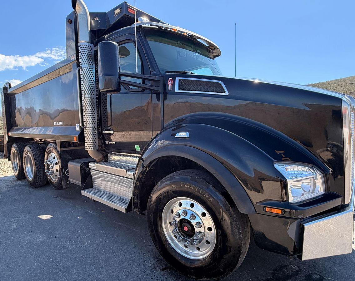 Used 2023 Kenworth T880 tri-axle dump truck, 123,870 miles