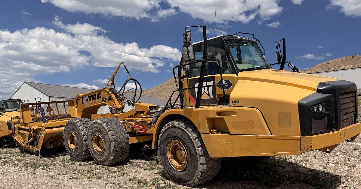 Used Caterpillar 740B, articulated dump truck with KTec Scraper