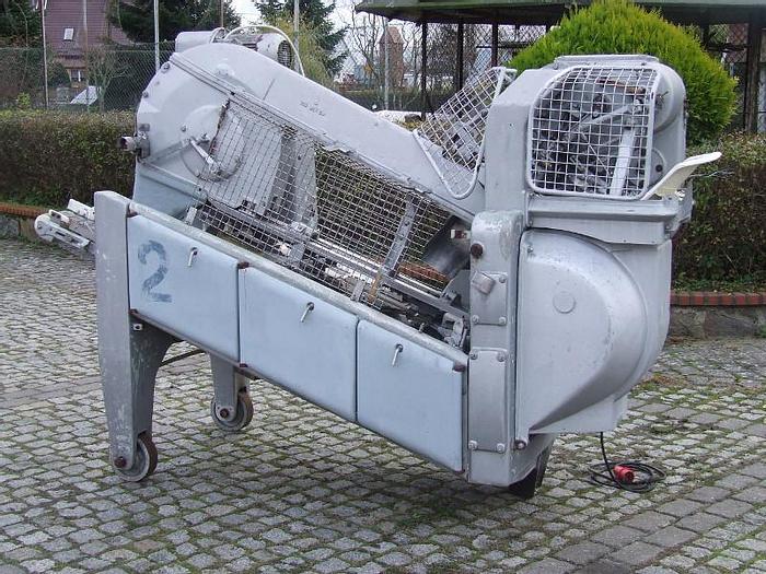 Used BAADER - Maszyna do filetowania, odgławiania i patroszenia ryb płaskich - Flądra itp.