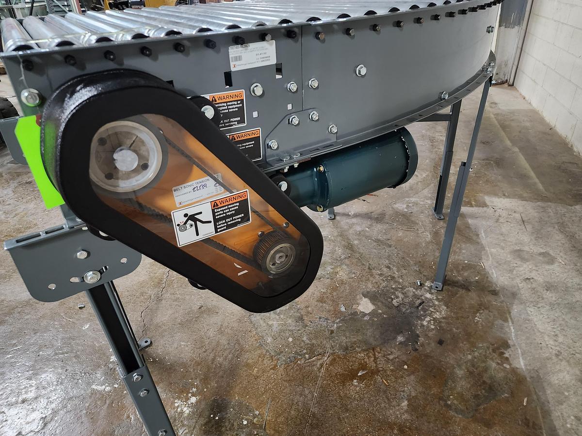 Used Intelligrated 28"b.f. Left Hand 30 Degree MDR Powered Zero Pressure Spur (#14A)