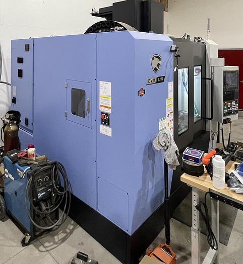Used 2021 DOOSAN BVM-5700 4-Axis CNC Vertical Machining Center ***Only 4 Cutting Hours***