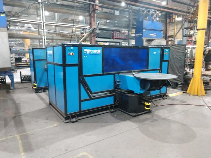 OTC WELD CELL WITH A/B TIL & ROTATE TABLES AND DUAL 72" CENTER TRUNIONS INSTALLED IN 2016