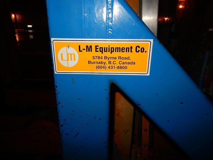 Used LM PAPER ROLL SAW