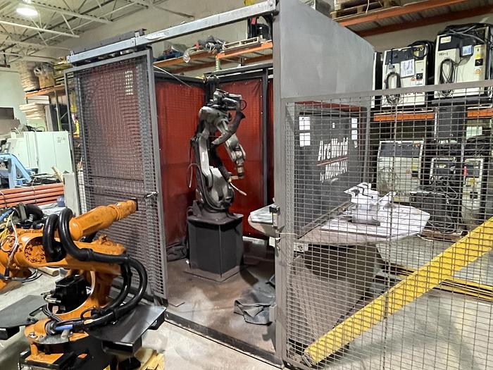 Used MOTOMAN ARCWORLD WELD CELL W/ INDEX TABLE AND UP6 ROBOT WITH XRC CONTROL