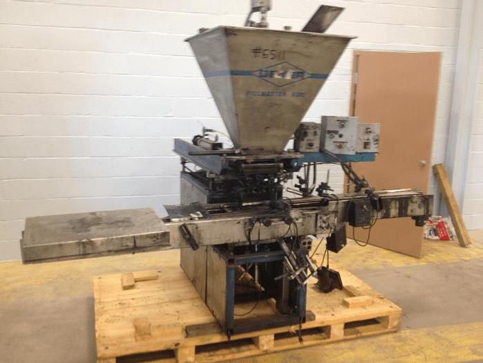 Used GEYER FILLMASTER FILLER WITH CONVEYOR