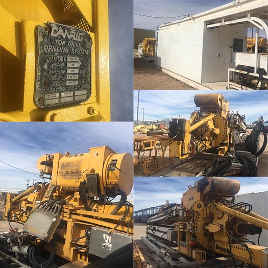 Used Canrig 1050E top drive complete with Power house and rails.