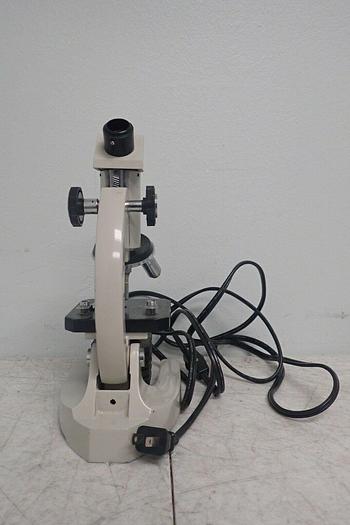 Used Southern Precision Instrument Model 1853L Microscope w/ Objectives 4x, 10x, 40x