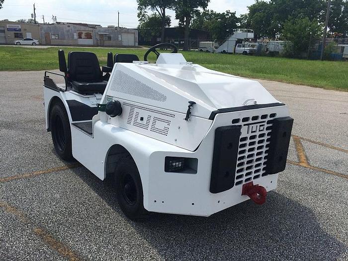 Used 1999 TUG MI60-13 baggage tow tractor. Power Steering. Zero-timed engine.