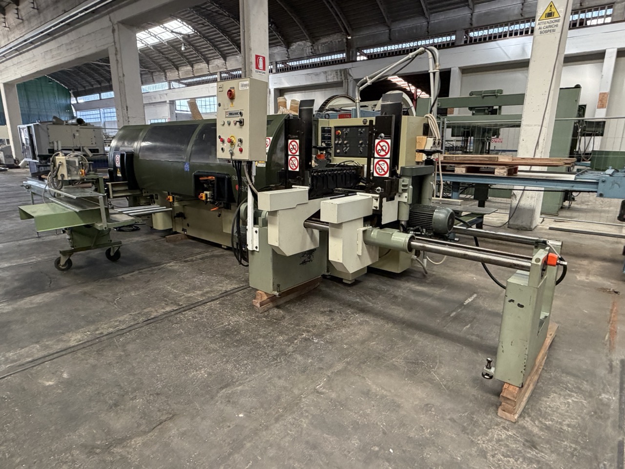 Usato 1995 SCM Superset 23 Plus Scorniciatrice marchiata CE, a 6 alberi, banco da mm. 230 con piano rigato.