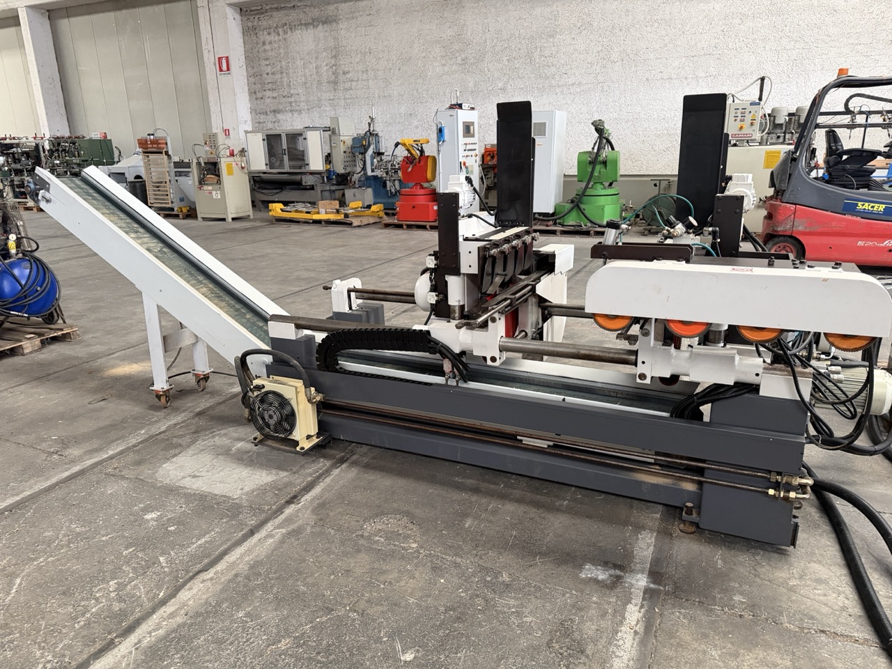 Usato 2002 Friulmac DUALFEED Troncatore - Caricatore per Scorniciatrice idraulico, automatico, con regolazione misure elettronica.