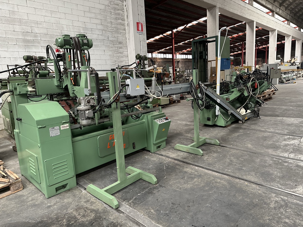 Usato Linea di tornitura e levigatura automatica, con Tornio Oma e Levigatrice Genini da 1200 mm