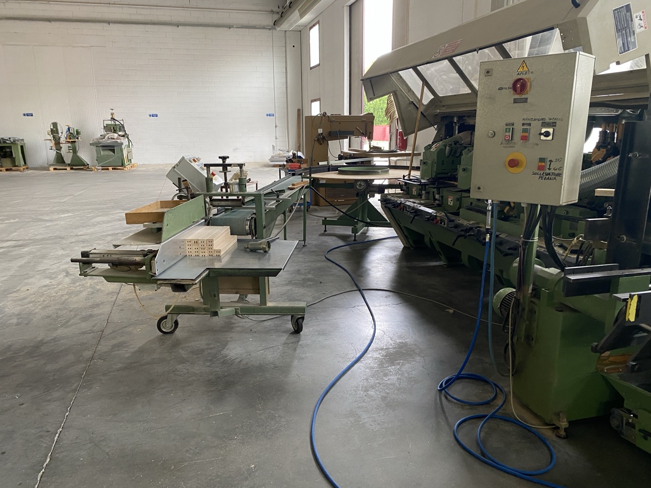 Usato Impianto completo 1994 Weinig U23 + Friulmac FN3 + giostra convogliatrice + nastro di ritorno + accessori