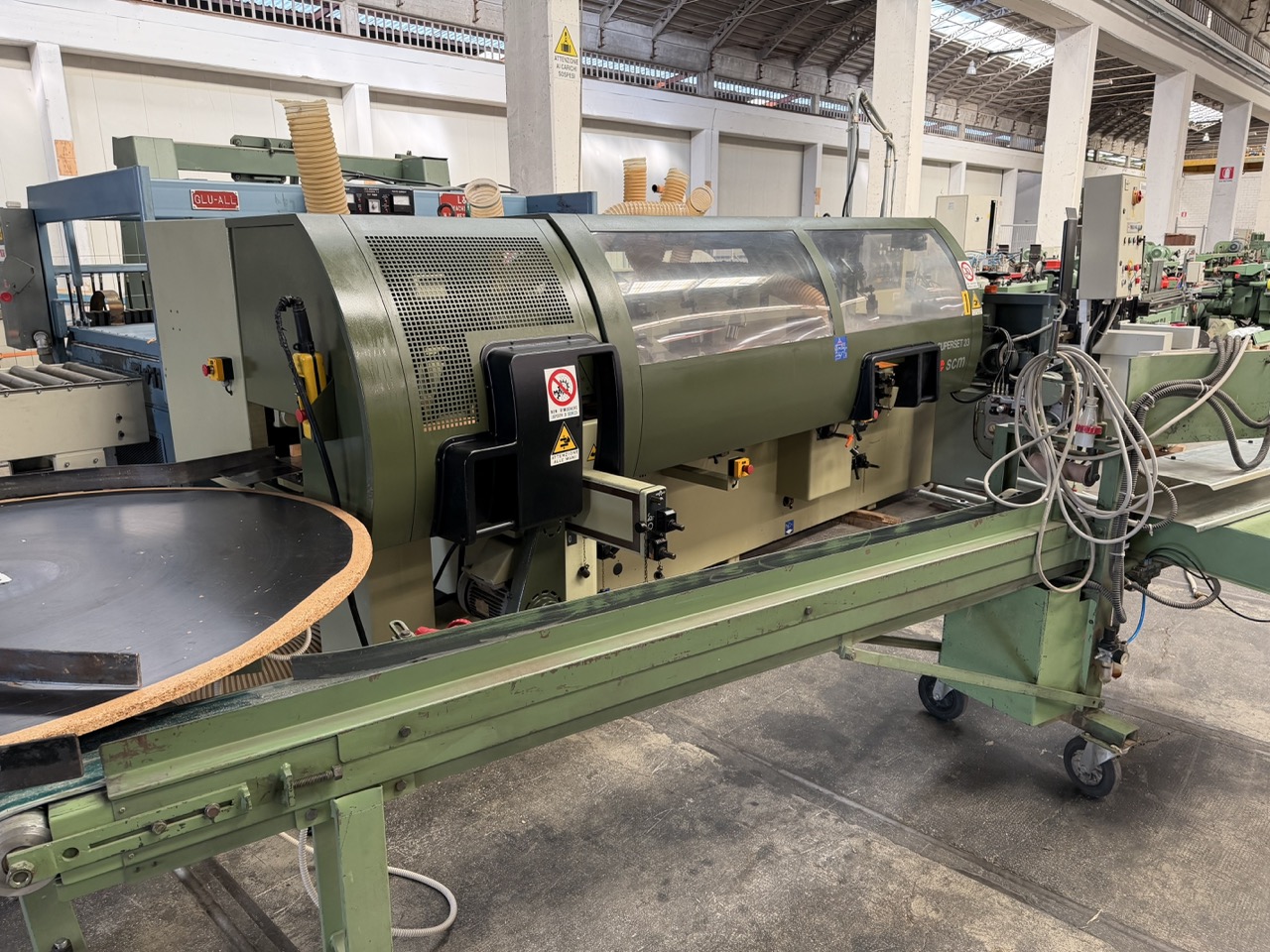 Usato 1995 SCM Superset 23 Plus Scorniciatrice marchiata CE, a 6 alberi + 1 universale, banco da mm. 230 con piano rigato.