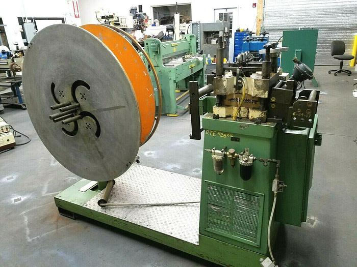 Used 4" Stock Leveler with double adjustable payoff reels stock feed press side