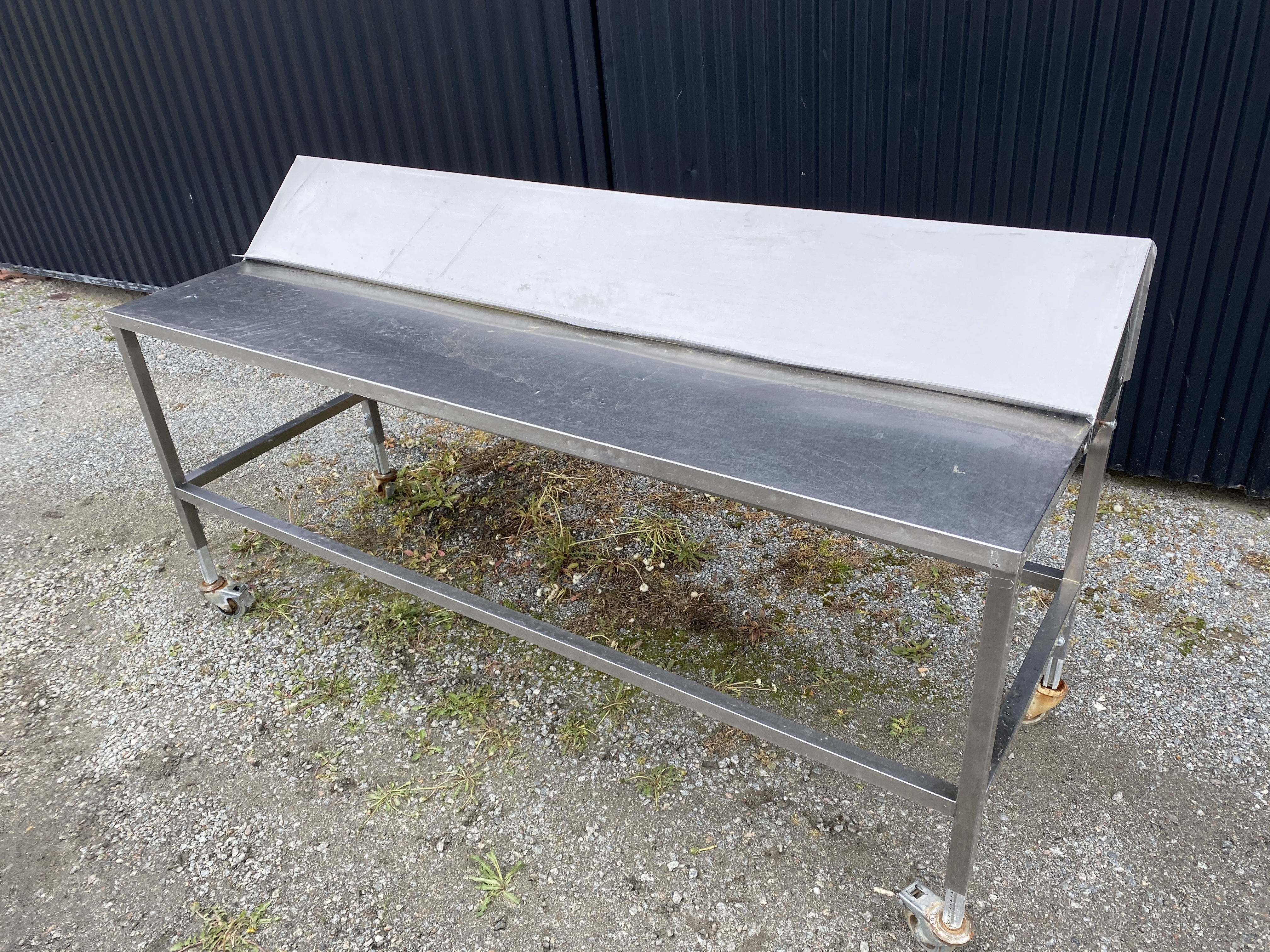 Begagnad Arbetsbord Rostfritt 214x71cm
