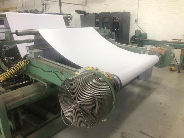 Used 72" WIDE REM CENTER SURFACE DUPLEX SLITTER REWINDER