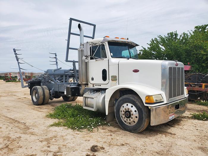 Used 1990 Peterbilt w/ New Holland 1051 Stack Retriever