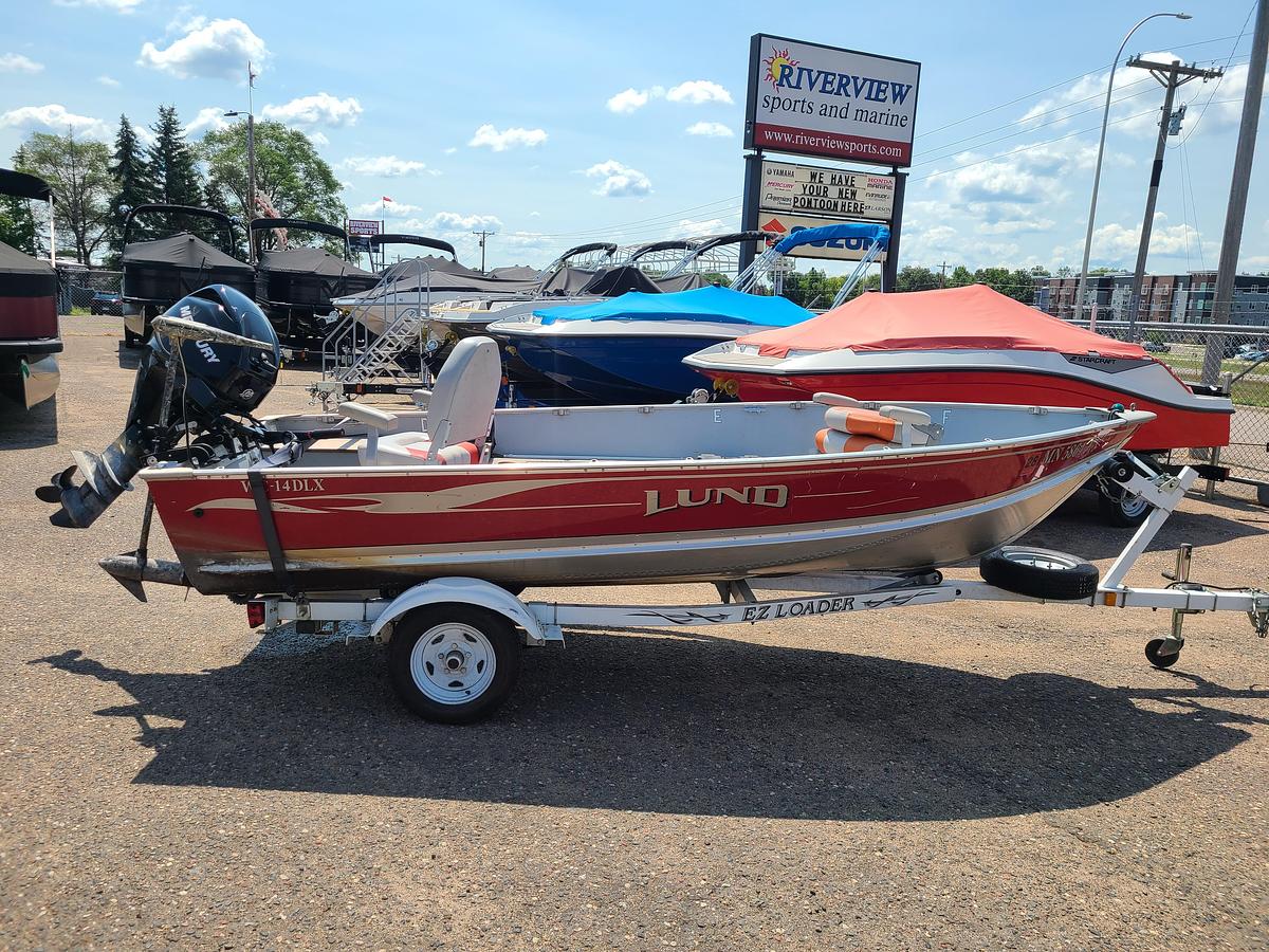 Used 2006 Lund WC-14DLX W/ A 2012 Mercury 25HP Motor & EZ Load'r Roller Trailer
