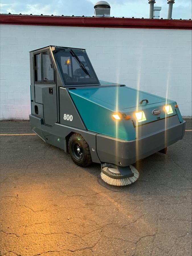 Used 2017 Tennant 800 Ride On Floor Parking Lot Sweeper w Cab Heat 448 Hrs