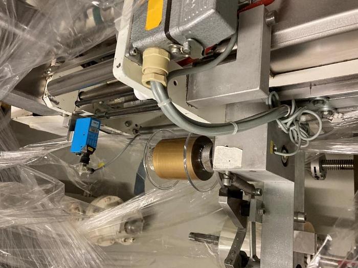 Used 1986 PRB Penta Film wrapping machine with labeler Etipack