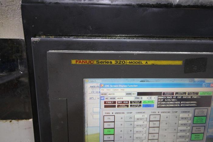 Used FUJI ANS-320TTS TWIN TURRET CNC LATHE WITH ROBOT LOAD/UNLOAD AND STOCKER TABLES