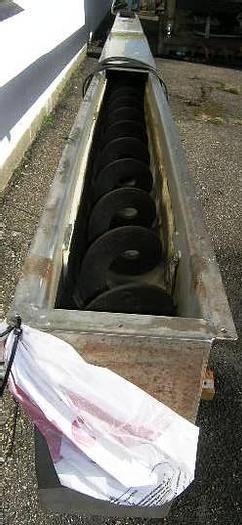 Used Sludge conveyor. 8,5 meter long. New gear motor