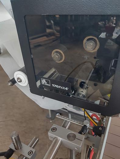 Used Lsi  Mdl 20 -627b  pressure sensitive top labeler with 8 foot  conveyor