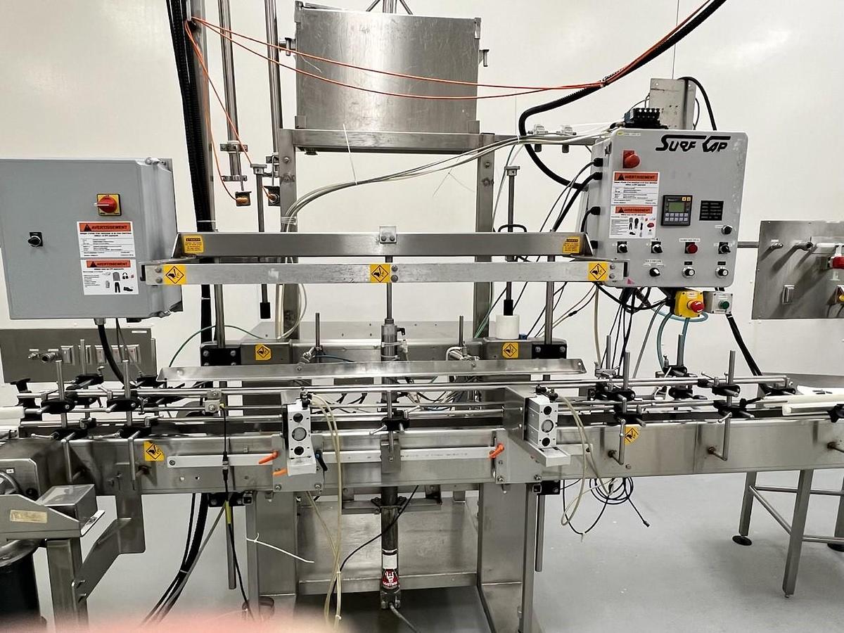 Used Surekap  model  Sk5000  piston  filler