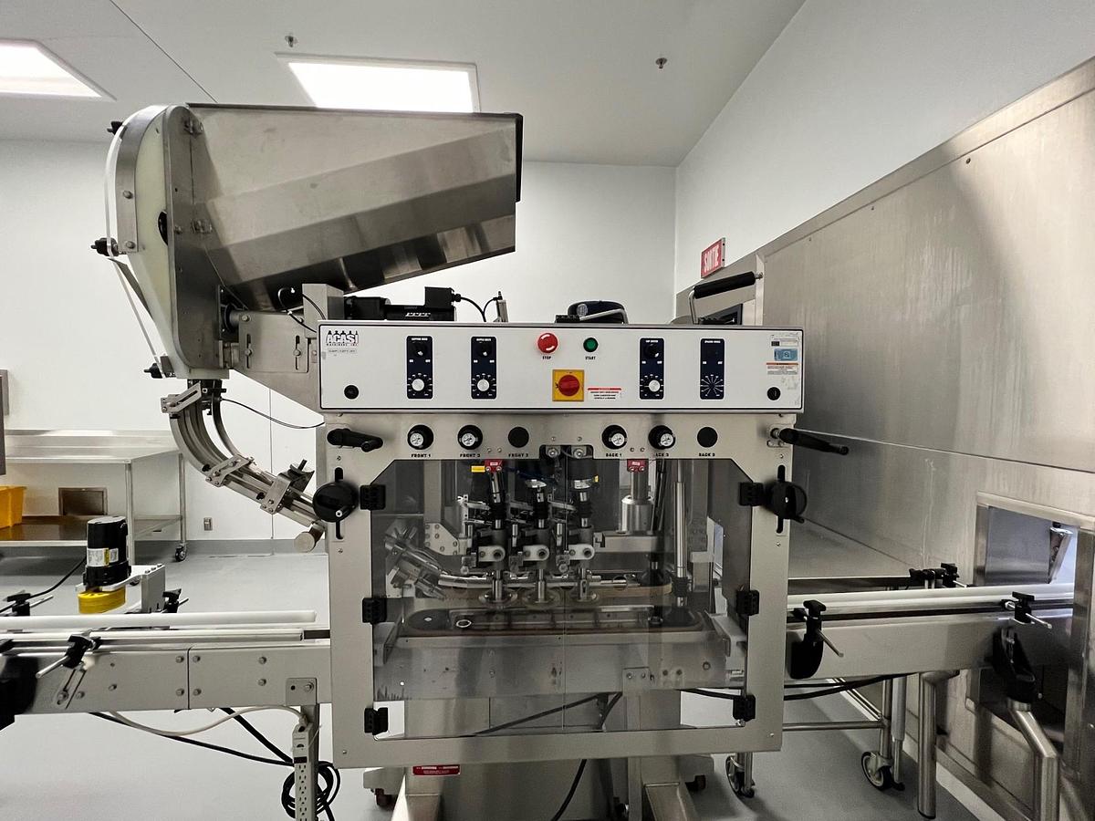 Used Acasi  6  spindle  capper